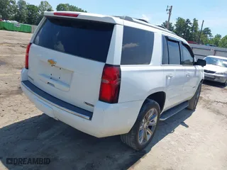 2018 Chevrolet Tahoe Premier with VIN 1GNSCCKCXJR324733, listed as a IAAI auction lot 40102147 with 119,134 mi miles. Bid and sale history available at carsss.com. Image 4.