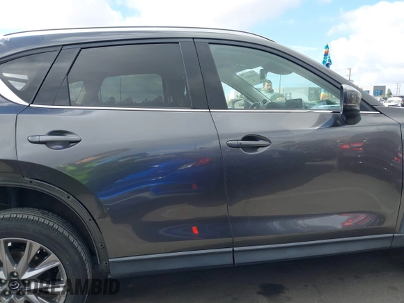 2021 Mazda CX-5 Grand Touring with VIN JM3KFADM2M1340669, listed as a IAAI auction lot 41916687 with 83,872 mi miles. Bid and sale history available at carsss.com. Image 14.