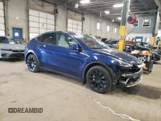 2023 Tesla Model Y Long Range with VIN 7SAYGDEE7PA180793, listed as a Copart auction lot 46706855 with 18,136 mi miles and Non Repairable. Bid and sale history available at DreamBid. Image 4.