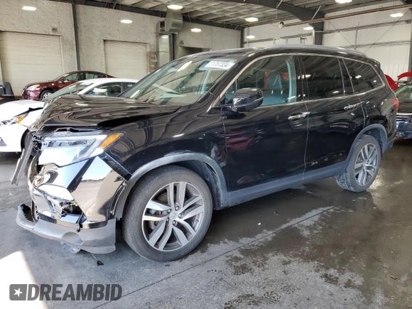 2017 Honda Pilot Touring with VIN 5FNYF6H97HB036935, listed as a Copart auction lot 71757334 with 68,641 mi miles and Salvage Title. Bid and sale history available at DreamBid. Image 1.
