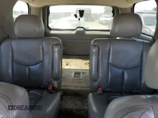 2003 GMC Yukon Denali z VIN 1GKEK63U13J255146, wystawiony jako Copart lot #53694665 z przebiegiem 256 523 mil mil oraz Szkody całkowita. Historia ofert i sprzedaży dostępna na DreamBid. Obrazek 10.