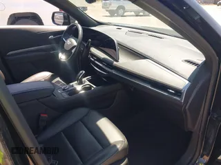 2024 Cadillac XT4 AWD Premium Luxury z VIN 1GYFZDR44RF144801, wystawiony jako IAAI lot #42646613 z przebiegiem 37 358 mil mil oraz . Historia ofert i sprzedaży dostępna na DreamBid. Obrazek 5.