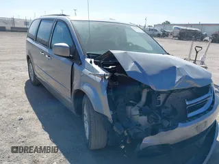2014 Dodge Grand Caravan SXT z VIN 2C4RDGCG6ER392508, wystawiony jako IAAI lot #42227934 z przebiegiem 126 405 mil mil oraz . Historia ofert i sprzedaży dostępna na DreamBid. Obrazek 1.