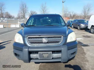 2003 Honda Pilot EX with VIN 2HKYF18503H610799, listed as a IAAI auction lot 41528867 with 323,810 mi miles. Bid and sale history available at carsss.com. Image 12.