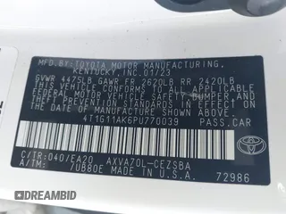 2023 Toyota Camry SE z VIN 4T1G11AK6PU770039, wystawiony jako IAAI lot #41375553 z przebiegiem 46 352 mil mil oraz . Historia ofert i sprzedaży dostępna na DreamBid. Obrazek 9.
