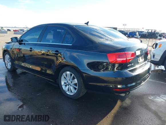2015 Volkswagen Jetta Sedan 1.8T SE with VIN 3VWD17AJ9FM341950, listed as a IAAI auction lot 41778772 with 121,954 mi miles. Bid and sale history available at carsss.com. Image 3.