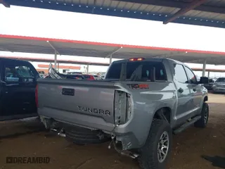 2016 Toyota Tundra 4WD Truck SR5 with VIN 5TFDW5F11GX566571, listed as a IAAI auction lot 41789354 with 122,493 mi miles. Bid and sale history available at carsss.com. Image 4.