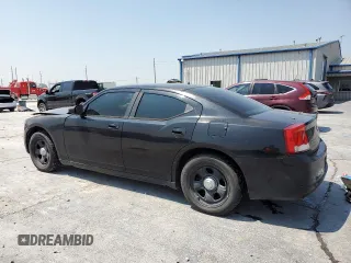 2009 Dodge Charger Police with VIN 2B3KA43T49H536981, listed as a Copart auction lot 54721694 with 160,508 mi miles and Salvage Title. Bid and sale history available at carsss.com. Image 2.