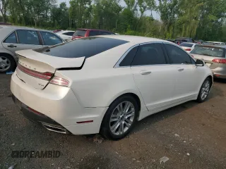 2014 Lincoln MKZ Hybrid z VIN 3LN6L2LU5ER823084, wystawiony jako Copart lot #59597565 z przebiegiem 126 402 mil mil oraz Szkoda całkowita • Salvage title. Historia ofert i sprzedaży dostępna na DreamBid. Obrazek 3.