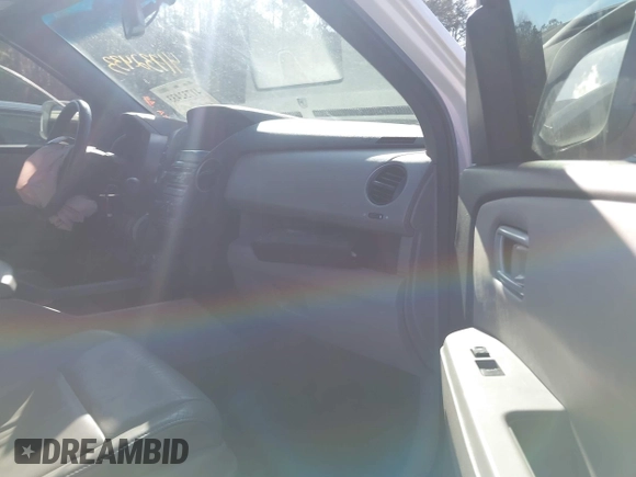 2013 Honda Pilot Touring with VIN 5FNYF3H95DB012903, listed as a IAAI auction lot 41732433 with 160,805 mi miles and . Bid and sale history available at carsss.com. Image 5.