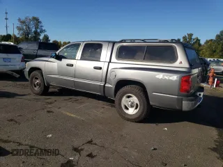 2006 Dodge Dakota ST with VIN 1D7HW28K96S716210, listed as a Copart auction lot 77416344 with 115,973 mi miles and Salvage Title. Bid and sale history available at DreamBid. Image 2.