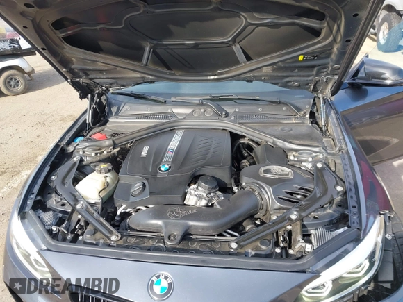 2018 BMW M2 with VIN WBS1J5C50JVE51869, listed as a IAAI auction lot 41814404 with 69,684 mi miles. Bid and sale history available at carsss.com. Image 10.
