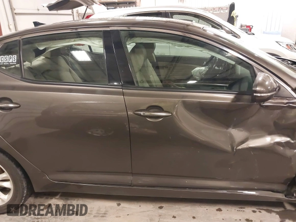 2013 Kia Optima EX with VIN 5XXGN4A72DG120129, listed as a IAAI auction lot 41858461 with 138,627 mi miles. Bid and sale history available at carsss.com. Image 17.