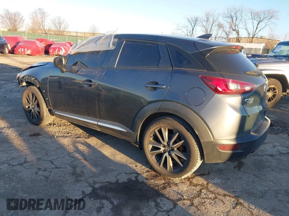 2016 Mazda CX-3 Grand Touring with VIN JM1DKBD74G0115936, listed as a IAAI auction lot 41296104 with 191,408 mi miles. Bid and sale history available at carsss.com. Image 3.