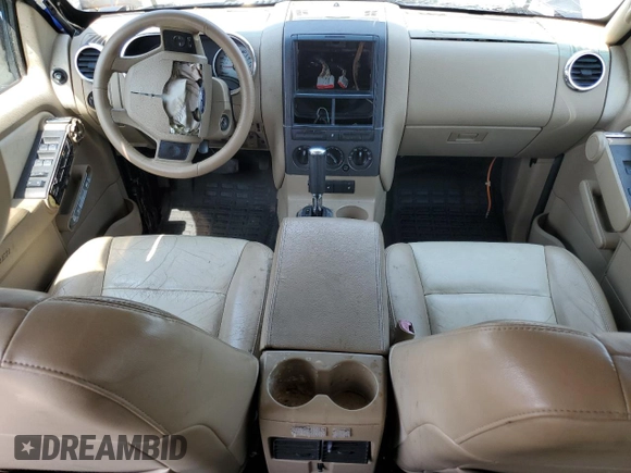 2007 Ford Explorer Sport Trac Limited z VIN 1FMEU33KX7UA51139, wystawiony jako Copart lot #60540505 z przebiegiem 219 148 mil mil oraz Szkoda całkowita • Salvage title. Historia ofert i sprzedaży dostępna na DreamBid. Obrazek 8.