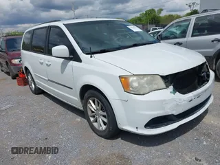 2014 Dodge Grand Caravan SXT with VIN 2C4RDGCG8ER264027, listed as a IAAI auction lot 42018350 with 311,876 mi miles and . Bid and sale history available at DreamBid. Image 1.