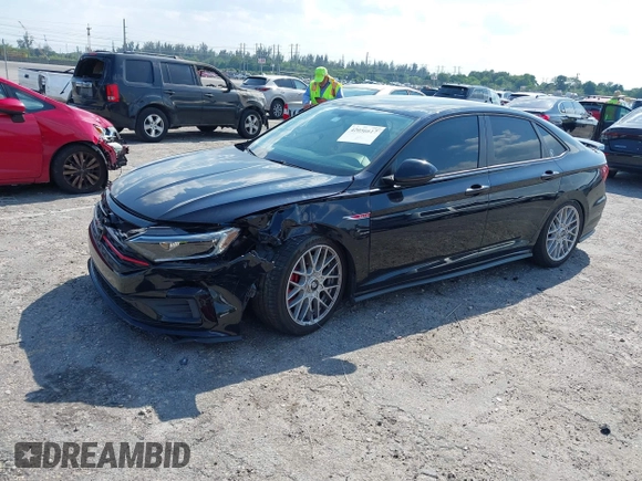 2019 Volkswagen Jetta GLI S with VIN 3VW5T7BU9KM142379, listed as a IAAI auction lot 42056617 with 77,283 mi miles and . Bid and sale history available at DreamBid. Image 6.