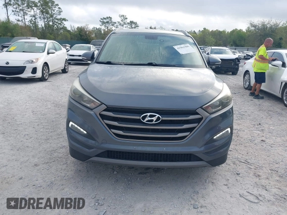 2016 Hyundai Tucson Limited with VIN KM8J33A27GU245096, listed as a IAAI auction lot 41961905 with 101,195 mi miles. Bid and sale history available at carsss.com. Image 12.
