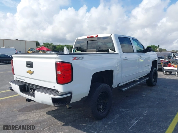 2016 Chevrolet Silverado 1500 LT with VIN 3GCUKREC3GG116107, listed as a IAAI auction lot 41490638 with 93,669 mi miles. Bid and sale history available at carsss.com. Image 4.
