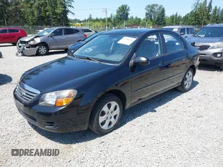 2009 Kia Spectra EX z VIN KNAFE221795624968, wystawiony jako IAAI lot #42406286 z przebiegiem 156 297 mil mil oraz . Historia ofert i sprzedaży dostępna na DreamBid. Obrazek 2.