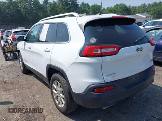 2016 Jeep Cherokee Latitude with VIN 1C4PJMCS6GW236286, listed as a IAAI auction lot 42492859 with 152,242 mi miles and . Bid and sale history available at DreamBid. Image 14.