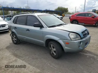 2005 Hyundai Tucson GL with VIN KM8JM12B95U080391, listed as a Copart auction lot 72551384 with 238,122 mi miles and Salvage Title. Bid and sale history available at carsss.com. Image 4.