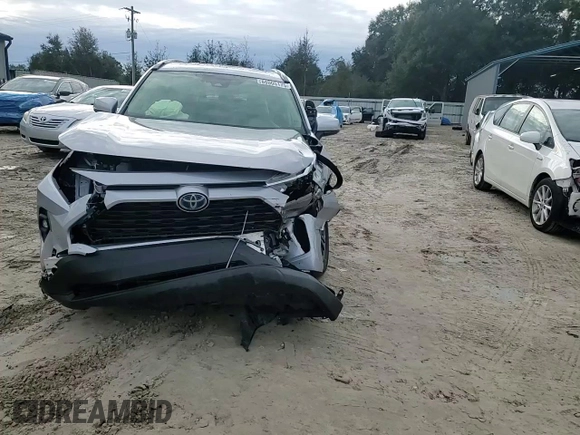 2023 Toyota RAV4 Hybrid XLE Premium z VIN JTMB6RFV8PD115723, wystawiony jako Copart lot #88005175 z przebiegiem 18 363 mil mil oraz Szkoda całkowita • Salvage title. Historia ofert i sprzedaży dostępna na DreamBid. Obrazek 14.