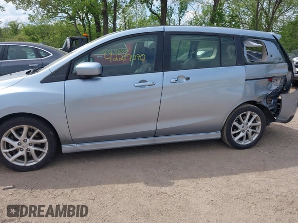 2012 Mazda 5 Grand Touring z VIN JM1CW2DL2C0127851, wystawiony jako IAAI lot #42217090 z przebiegiem 123 900 mil mil oraz . Historia ofert i sprzedaży dostępna na DreamBid. Obrazek 14.