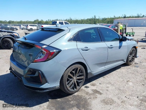 2021 Honda Civic Hatchback Sport with VIN SHHFK7H45MU213228, listed as a IAAI auction lot 41780240 with 58,998 mi miles. Bid and sale history available at carsss.com. Image 4.