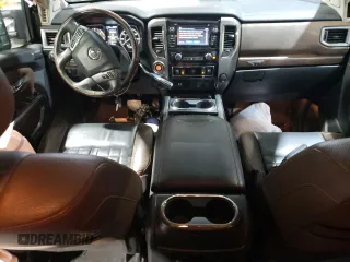 2017 Nissan Titan XD SL with VIN 1N6BA1F48HN561757, listed as a Copart auction lot 87204594 with 100,339 mi miles and Salvage Title. Bid and sale history available at carsss.com. Image 8.