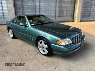 2002 Mercedes-Benz SL 500 with VIN WDBFA68F42F204673, listed as a Copart auction lot 56757525 with 32,967 mi miles and Clean title. Bid and sale history available at DreamBid. Image 1.