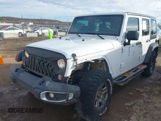 2017 Jeep Wrangler Unlimited Sport with VIN 1C4BJWDG2HL721379, listed as a IAAI auction lot 41314767 with 174,228 mi miles. Bid and sale history available at carsss.com. Image 6.