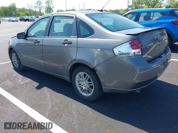 2009 Ford Focus SE with VIN 1FAHP35N19W246382, listed as a IAAI auction lot 42043020 with 197,707 mi miles. Bid and sale history available at carsss.com. Image 3.