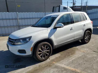 2014 Volkswagen Tiguan SE z VIN WVGAV3AXXEW578724, wystawiony jako Copart lot #88776125 z przebiegiem 145 600 mil mil oraz Czysty tytuł • Clean title. Historia ofert i sprzedaży dostępna na DreamBid. Obrazek 1.