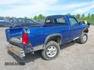 1994 Dodge Dakota z VIN 1B7GG26X5RW145863, wystawiony jako IAAI lot #42345217 z przebiegiem 117 441 mil mil oraz . Historia ofert i sprzedaży dostępna na DreamBid. Obrazek 4.