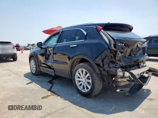 2023 Cadillac XT4 FWD Luxury z VIN 1GYAZAR42PF102696, wystawiony jako Copart lot #60524065 z przebiegiem 1 903 mil mil oraz Szkoda całkowita • Salvage title. Historia ofert i sprzedaży dostępna na DreamBid. Obrazek 2.