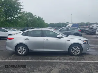 2016 Kia Optima LX z VIN 5XXGT4L32GG025333, wystawiony jako IAAI lot #42270433 z przebiegiem 96 422 mil mil oraz . Historia ofert i sprzedaży dostępna na DreamBid. Obrazek 13.