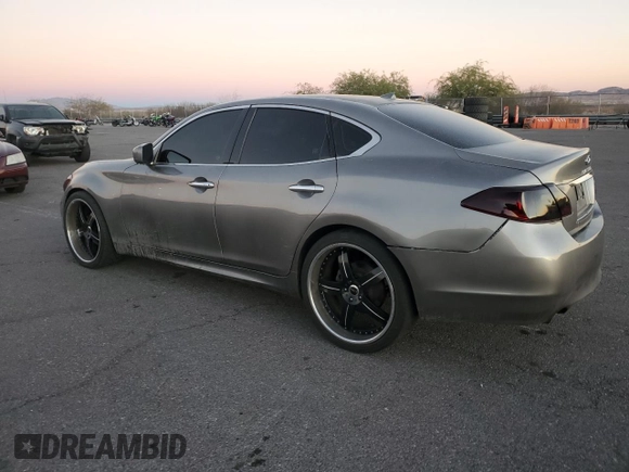 2011 Infiniti M37 with VIN JN1BY1AP3BM321581, listed as a Copart auction lot 79275854 with 215,496 mi miles and Salvage Title. Bid and sale history available at carsss.com. Image 2.
