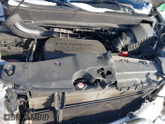 2015 Honda Pilot SE with VIN 5FNYF4H33FB064910, listed as a IAAI auction lot 41357315 with 115,879 mi miles and . Bid and sale history available at DreamBid. Image 10.