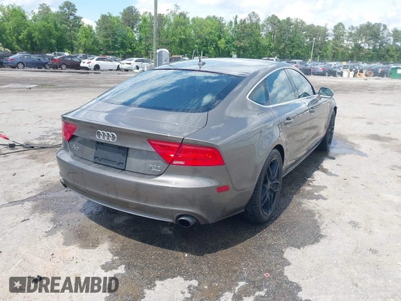 2012 Audi A7 Premium Plus with VIN WAUYGAFC1CN085666, listed as a IAAI auction lot 42177867 with 242,775 mi miles and . Bid and sale history available at DreamBid. Image 4.