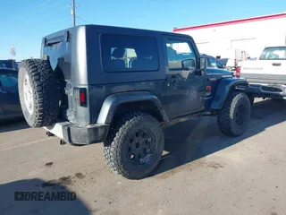 2008 Jeep Wrangler Sahara with VIN 1J4FA54108L543764, listed as a IAAI auction lot 41867734 with 186,145 mi miles and . Bid and sale history available at DreamBid. Image 4.