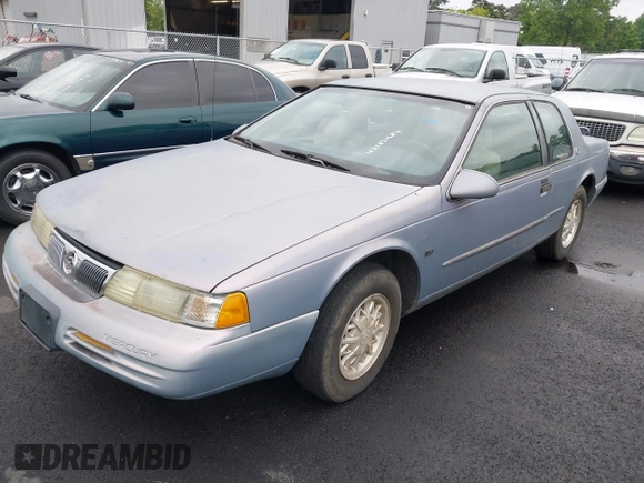 1995 Mercury Cougar z VIN 1MELM62W3SH600097, wystawiony jako IAAI lot #42185484 z przebiegiem 216 393 mil mil oraz . Historia ofert i sprzedaży dostępna na DreamBid. Obrazek 2.