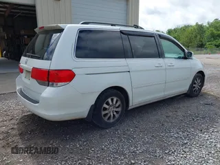 2010 Honda Odyssey EX-L with VIN 5FNRL3H67AB003148, listed as a IAAI auction lot 42244575 with 176,119 mi miles and . Bid and sale history available at DreamBid. Image 4.