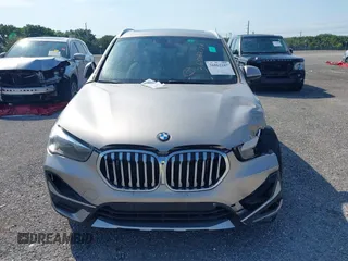 2021 BMW X1 sDrive28i z VIN WBXJG7C09M5U26043, wystawiony jako IAAI lot #36062187 z przebiegiem 14 844 mil mil oraz . Historia ofert i sprzedaży dostępna na DreamBid. Obrazek 12.