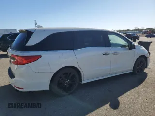 2019 Honda Odyssey Elite with VIN 5FNRL6H98KB004399, listed as a Copart auction lot 43932075 with 35,843 mi miles and Salvage Title. Bid and sale history available at DreamBid. Image 3.