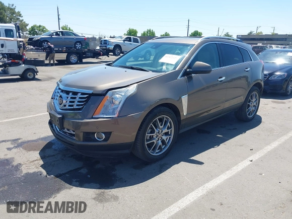 2015 Cadillac SRX Performance Collection with VIN 3GYFNFE35FS569682, listed as a IAAI auction lot 42322229 with 124,365 mi miles and . Bid and sale history available at DreamBid. Image 17.