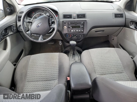 2006 Ford Focus S z VIN 1FAFP34N36W171785, wystawiony jako Copart lot #55815195 z przebiegiem 164 074 mil mil oraz Szkoda całkowita • Salvage title. Historia ofert i sprzedaży dostępna na DreamBid. Obrazek 8.