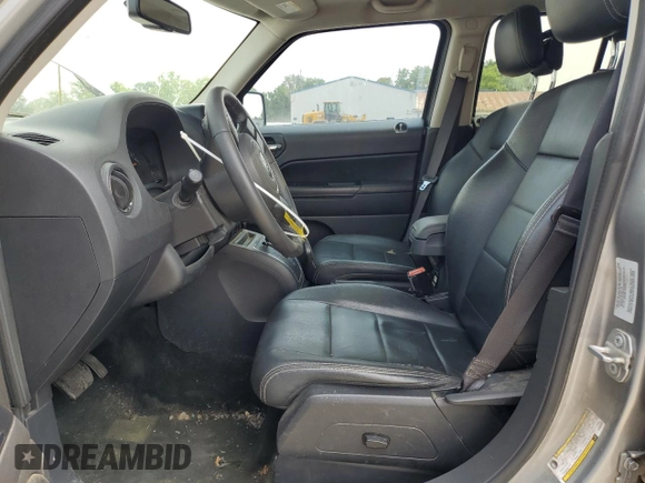 2016 Jeep Patriot Latitude with VIN 1C4NJRFB8GD658202, listed as a Copart auction lot 58961465 with 80,781 mi miles and Salvage title. Bid and sale history available at DreamBid. Image 7.
