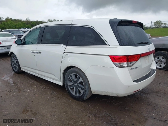 2015 Honda Odyssey Touring Elite with VIN 5FNRL5H98FB076428, listed as a IAAI auction lot 41998339 with 114,573 mi miles. Bid and sale history available at carsss.com. Image 3.
