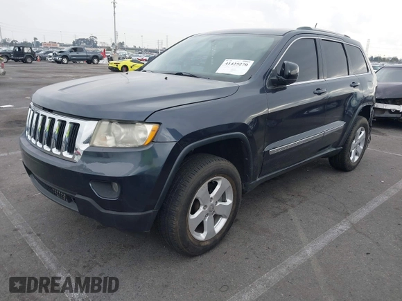 2013 Jeep Grand Cherokee Laredo with VIN 1C4RJEAGXDC620968, listed as a IAAI auction lot 41425270 with 127,739 mi miles. Bid and sale history available at carsss.com. Image 2.